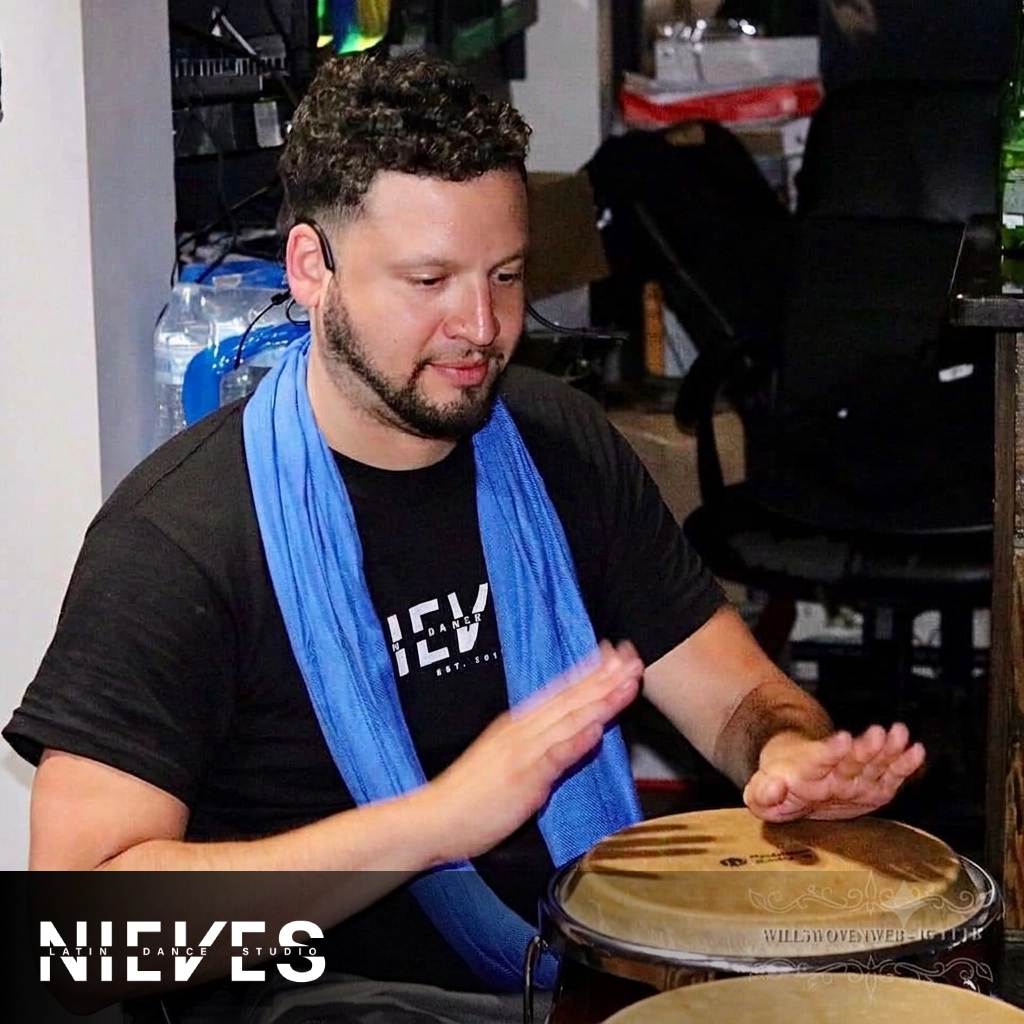 Will Nieves playing with drums